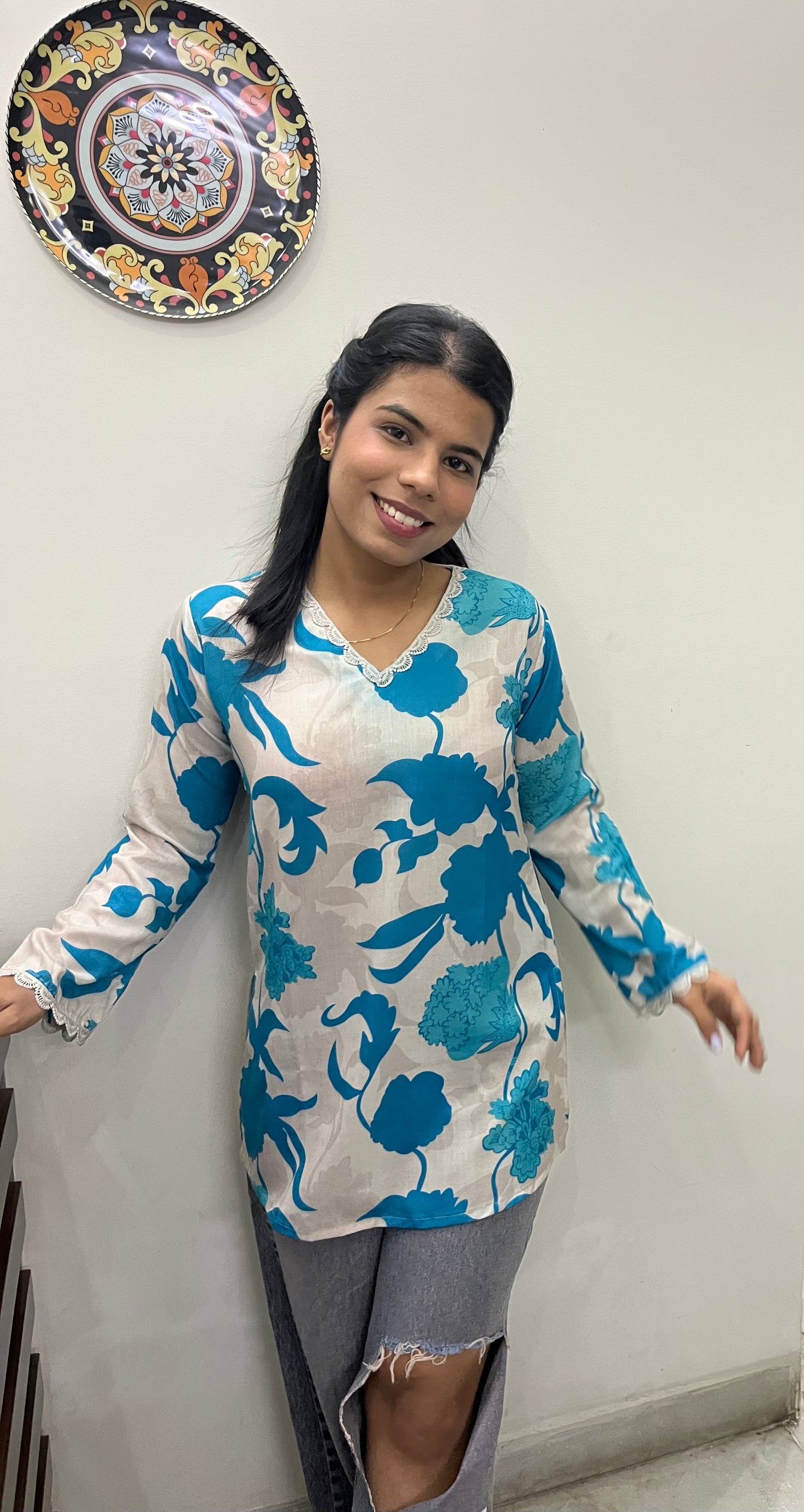 Blue printed kurti top with lace work