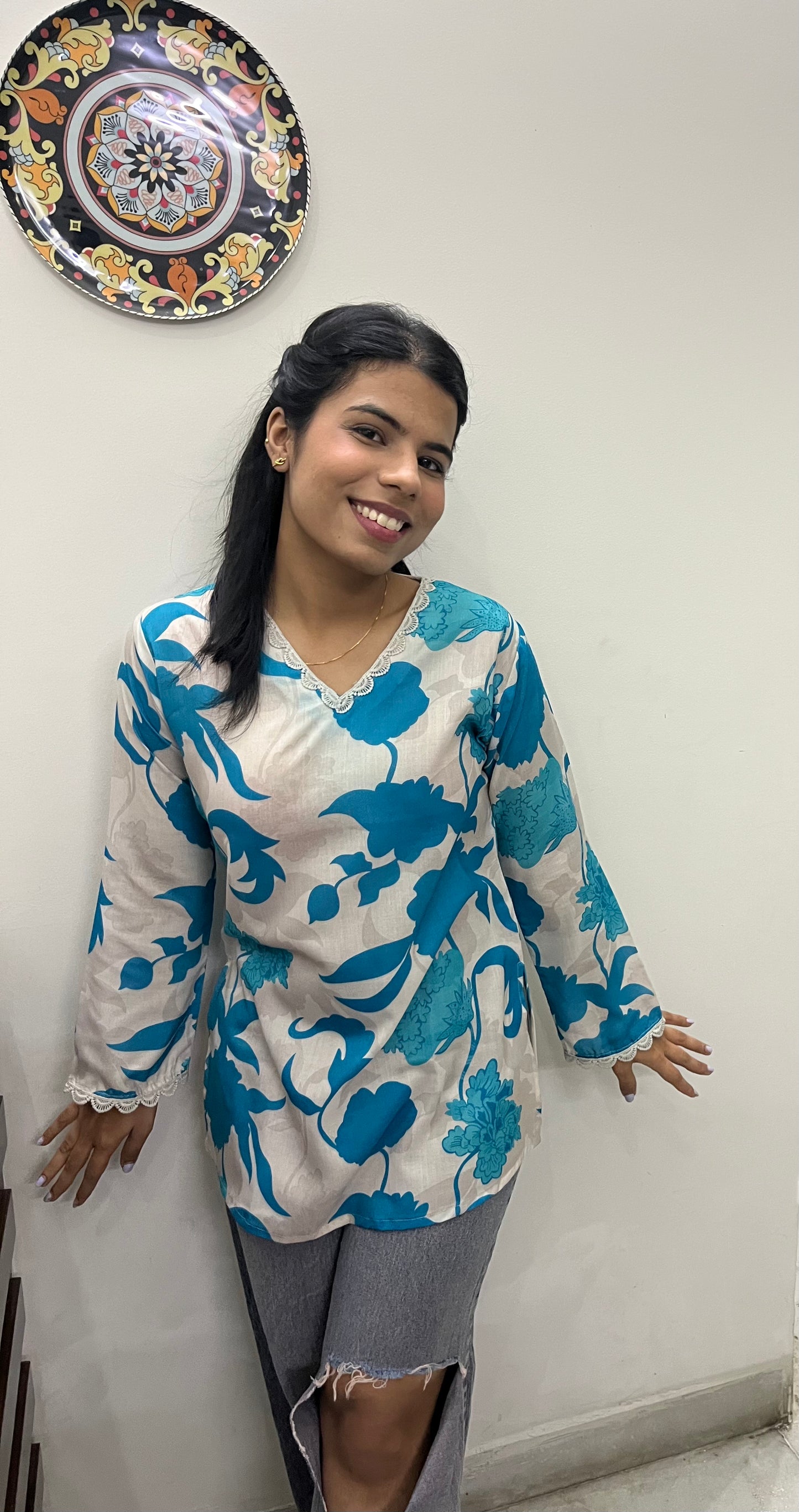 Blue printed kurti top with lace work