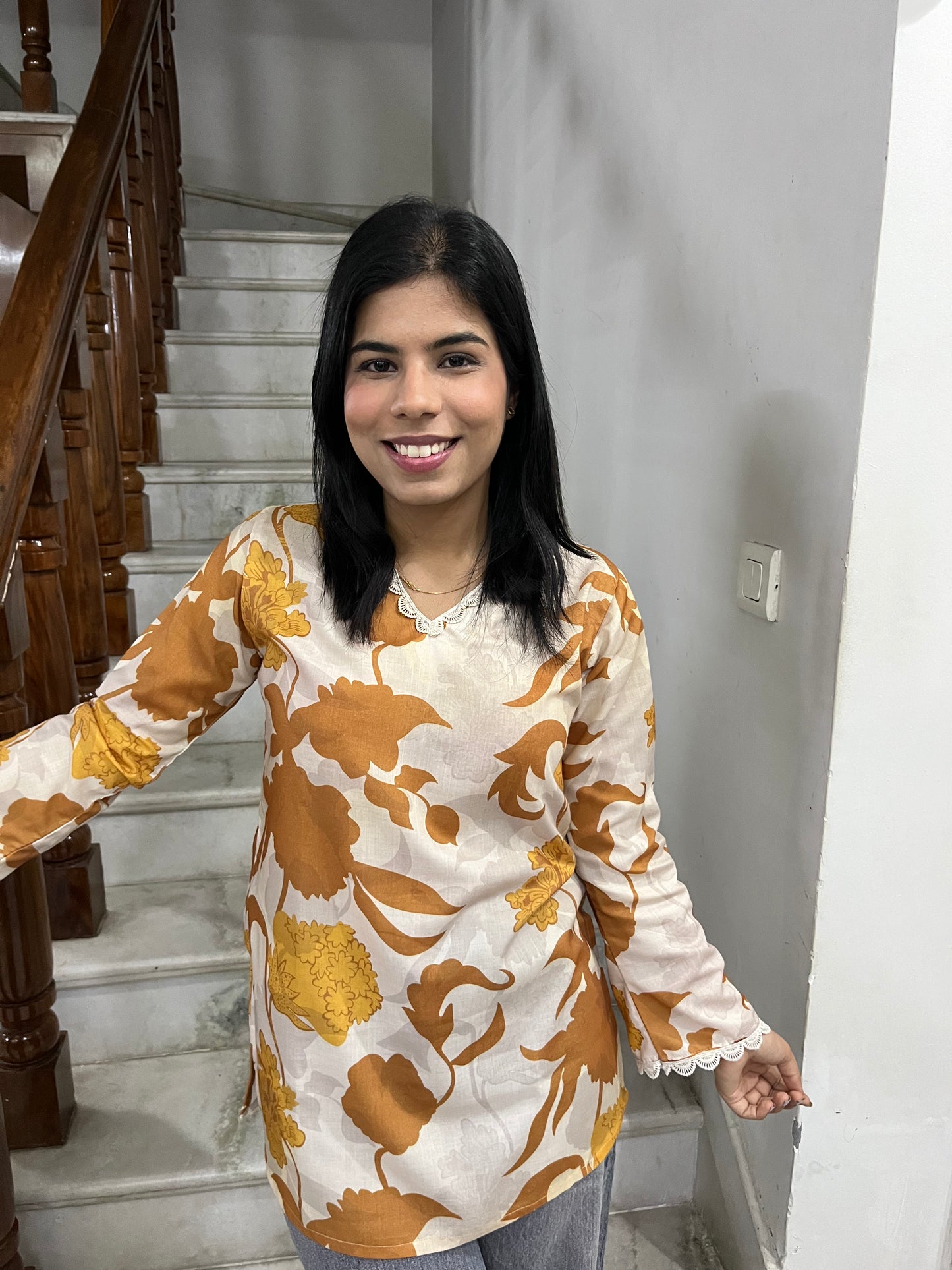 Yellow printed kurti top with lace work