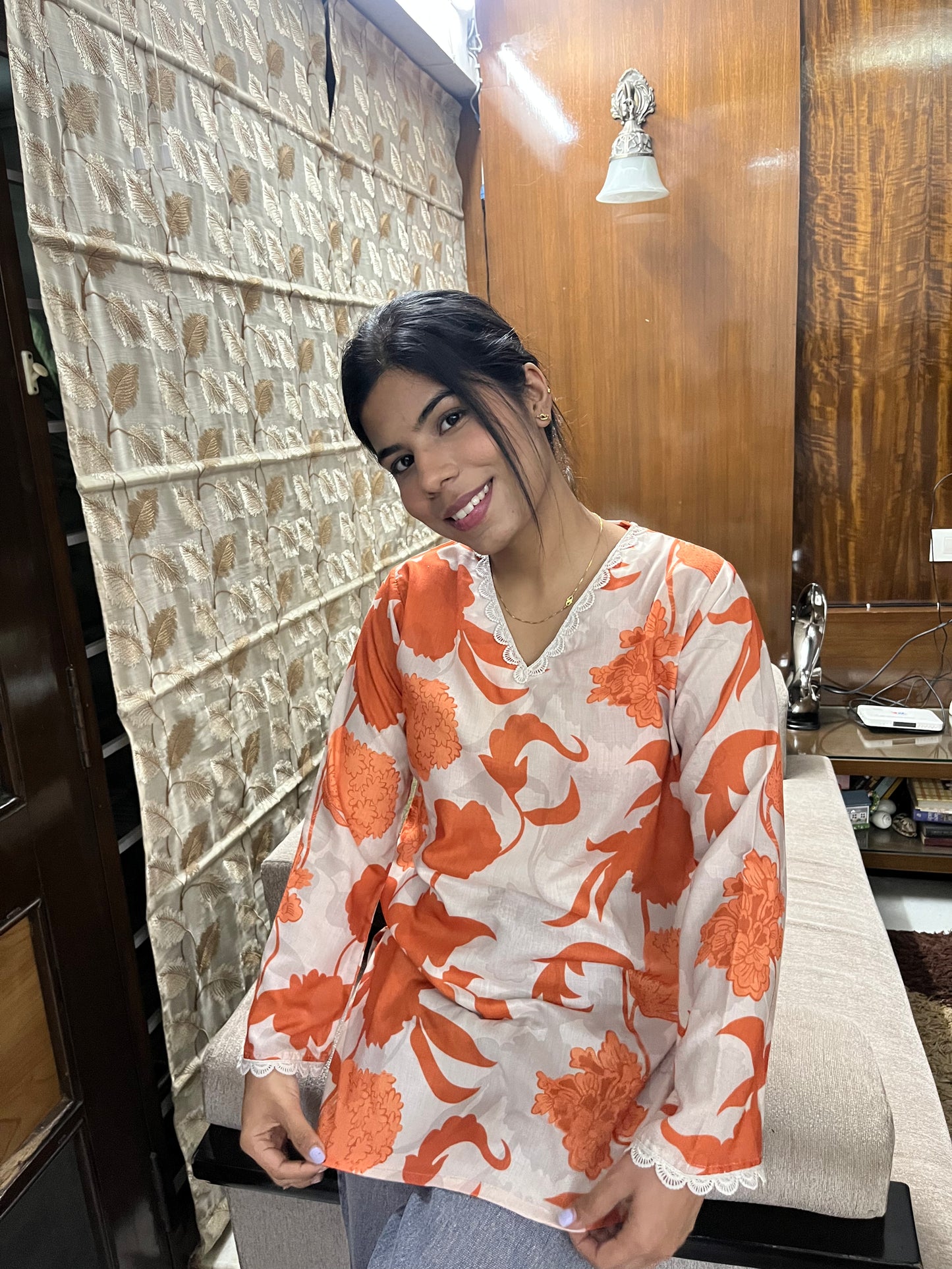 Orange printed casual wear kurti top
