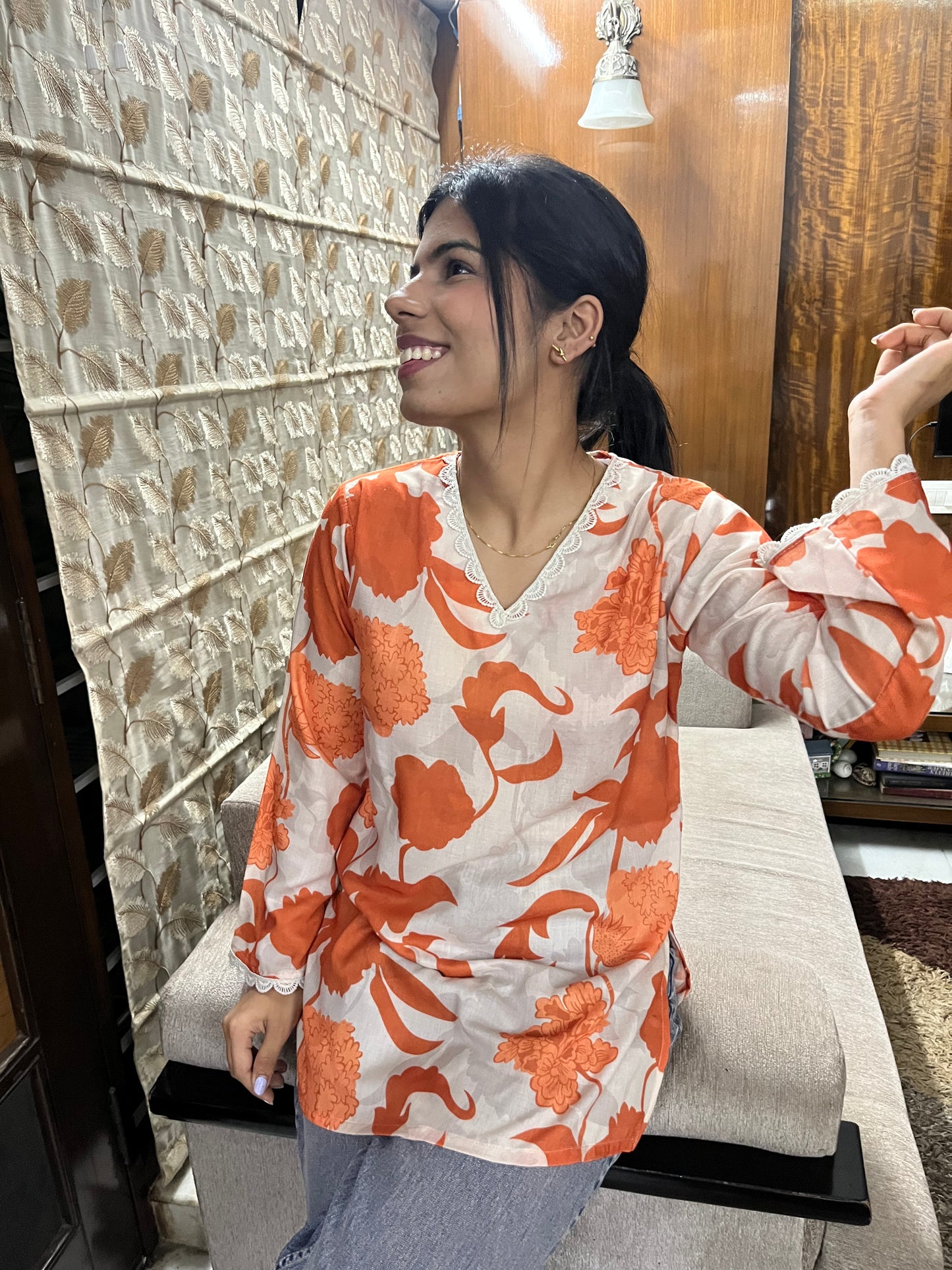 Orange printed casual wear kurti top