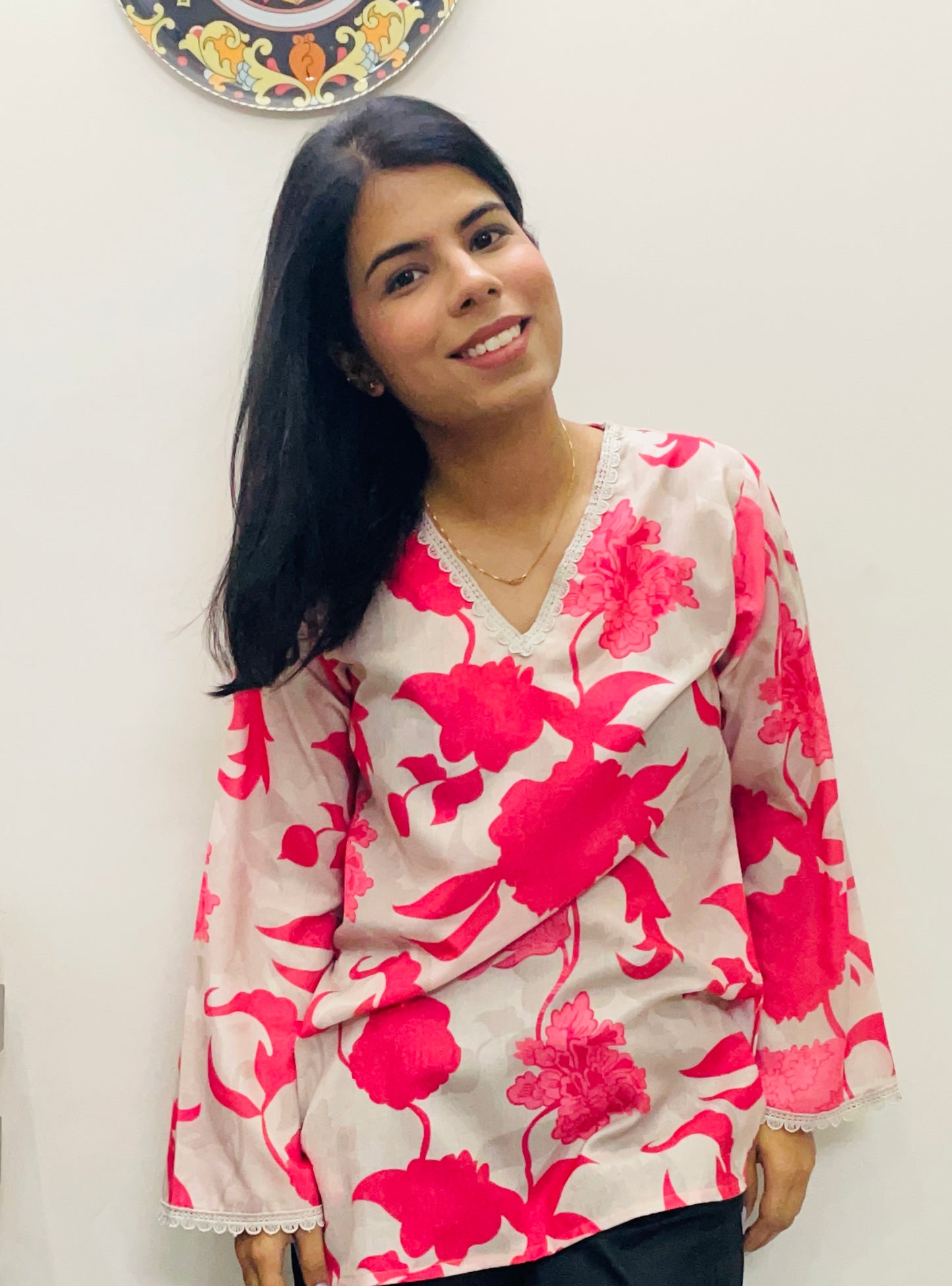 Pink printed kurti top with lace work