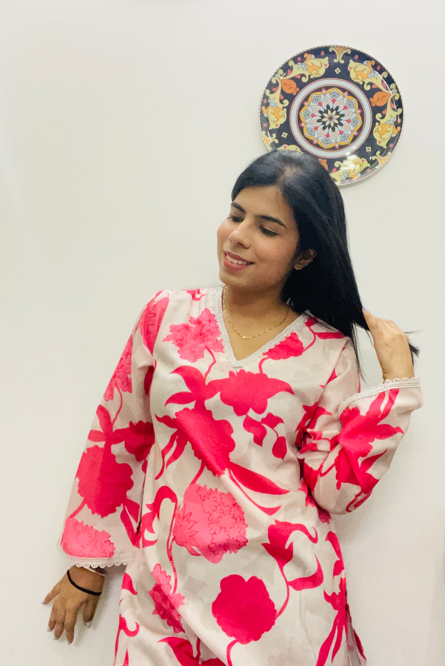 Pink printed kurti top with lace work