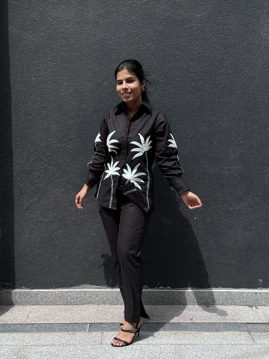 Black linen co-ord set with white embroidery