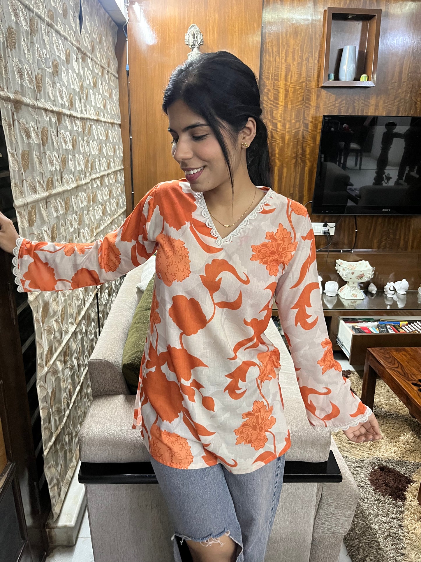 Orange printed casual wear kurti top